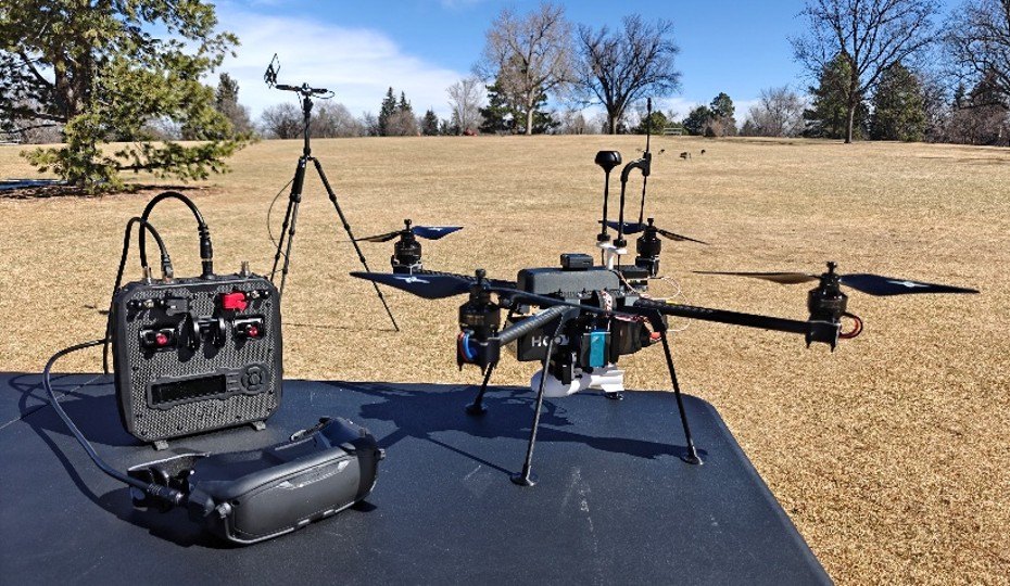 AeroFly Purple Zero compact recon drone with FPV controller and goggles in the field