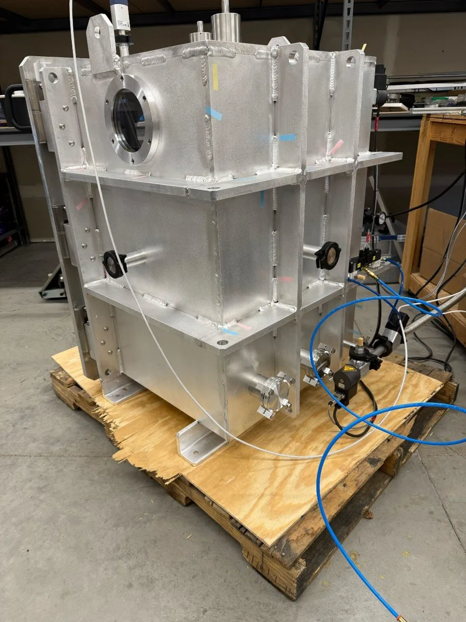 Vacuum chamber front door, viewport, and toggle latches