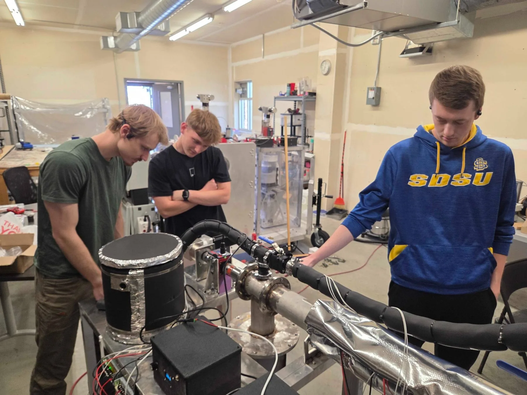 AeroFly engineers testing VADER in the lab
